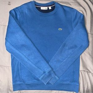 Lacoste blue long sleeve crew neck.
